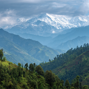 u1127339427 Nepal forests with Himalaya hilltops in backgroun b235a59f-081f-4a2a-b67e-296156c4e285 3